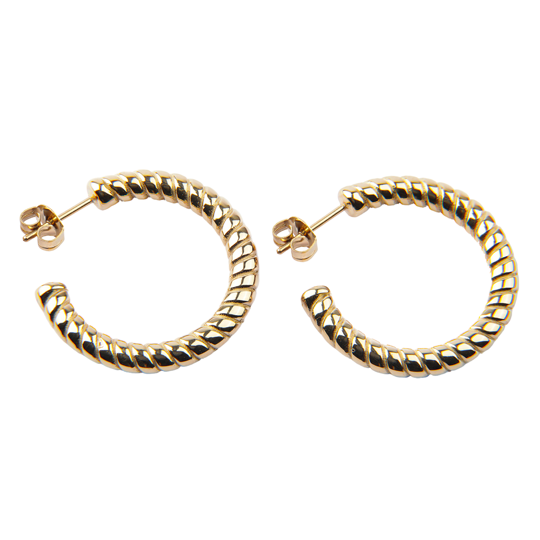 Aros tipo argolla abierta con patrón espiral texturizado, generando reflejos dinámicos.

Di Vogel