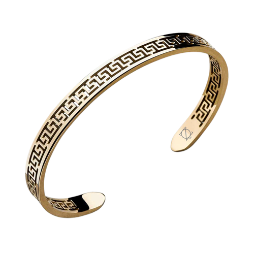 Brazalete con patrón continuo tipo greca, grabado en relieve que aporta textura y profundidad visual.