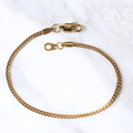 Pulsera Serpente Aurea Liscia  2mm en Oro laminado 18K. Su diseño de eslabón serpiente flexible aporta sofisticación minimalista y presencia limpia. Broche langosta tradicional.
Descúbrela en distintos tamaños y presentación.
Di Vogel Joyería Premium Chile