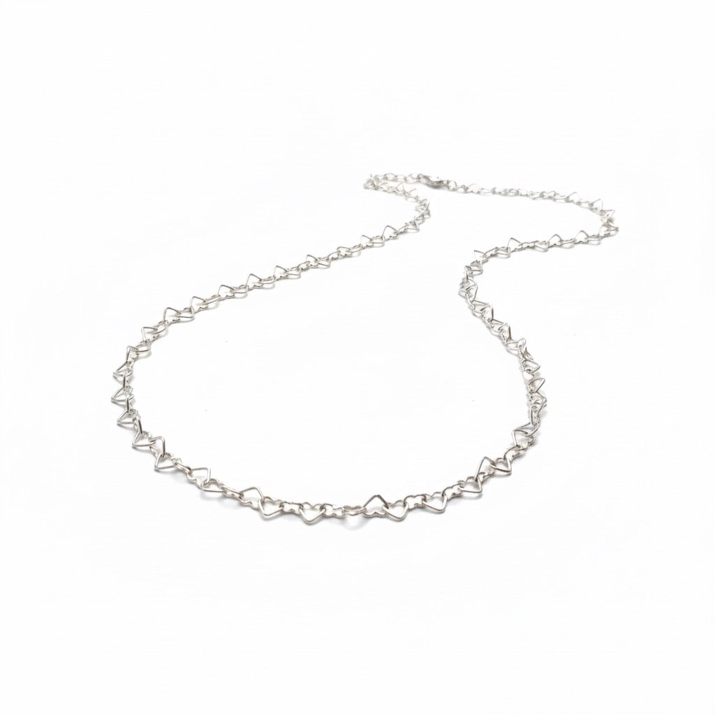 Cadena Cuori Intrecciati de plata italiana 925. Diseño de corazones entrelazados unos con otros
Línea Essenziale Di Vogel