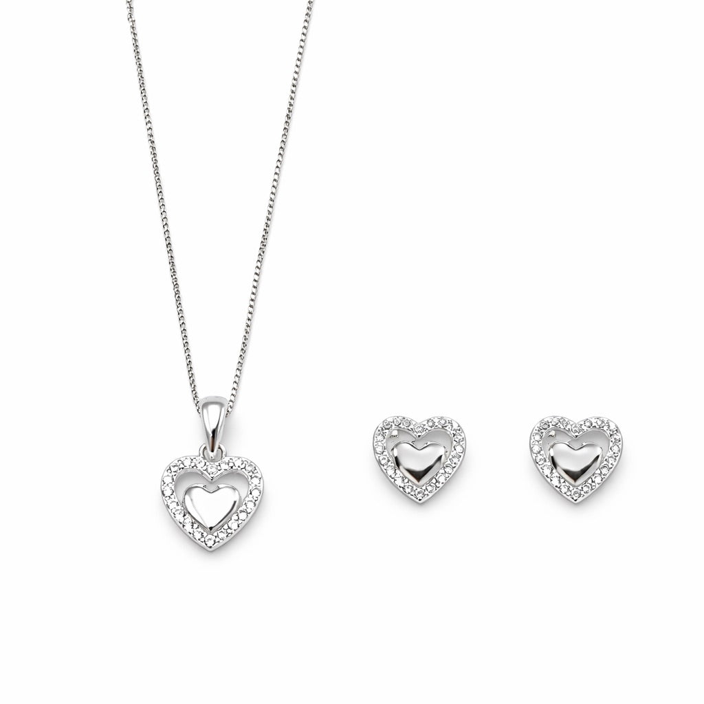 Conjunto de plata italiana 925. Contiene Cadena, colgante y aros de corazón. Su diseño es de corazón con microcircones con un corazon de plata lisa en el interior. Línea Signature de Di Vogel