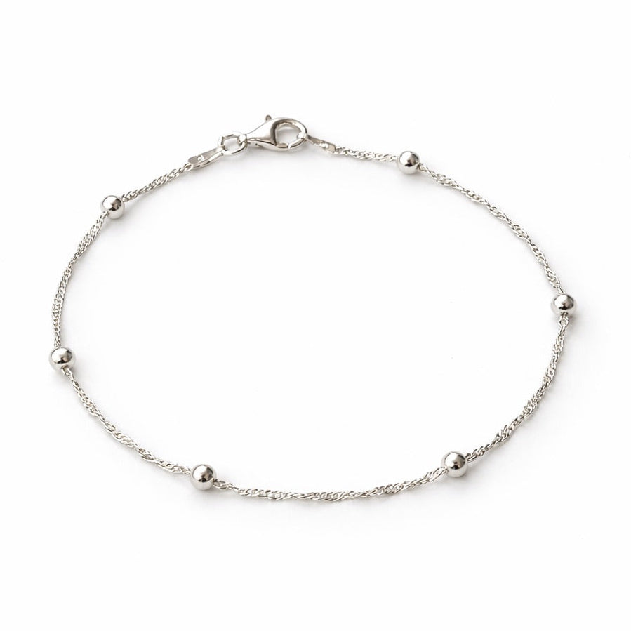 Pulsera Sfere Singapur plata italiana. Diseño con eslabon singapur y esferas.
Línea Essenziale Di Vogel